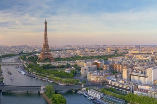 Aerial view of Paris with Eiffel tower during sunset