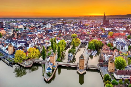 Covered bridges and Petite France in Strasbourg Ponts Couverts Bridges and historic quarter Petite France in Strasbourg at sunrise